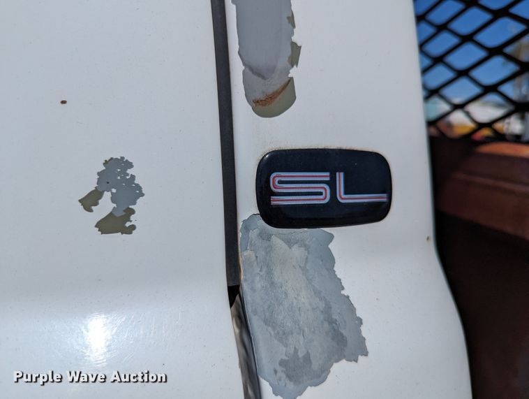 image for item LM9803 2001 GMC Sierra 3500 SL  Ext. Cab flatbed pickup truck