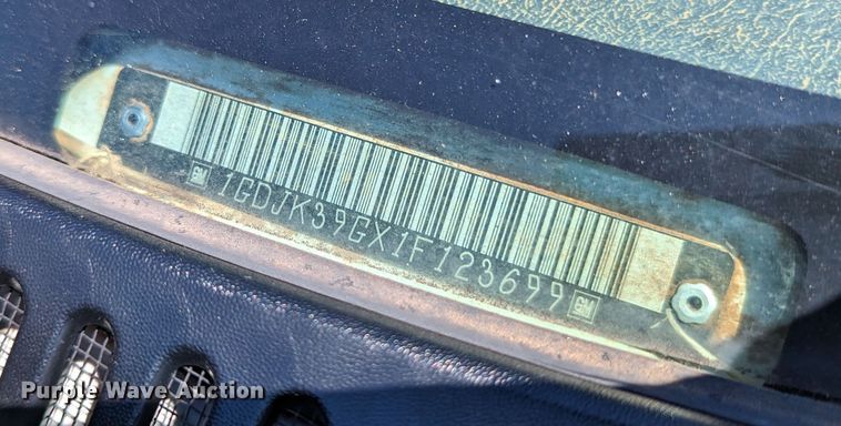 image for item LM9803 2001 GMC Sierra 3500 SL  Ext. Cab flatbed pickup truck