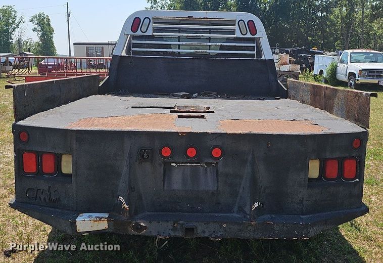 image for item LW9753 2005 Ford F350 Super Duty  Crew Cab flatbed pickup truck