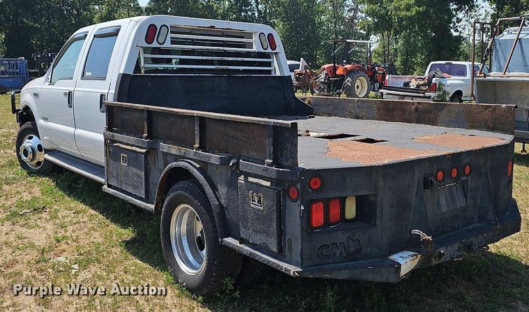 image for item LW9753 2005 Ford F350 Super Duty  Crew Cab flatbed pickup truck