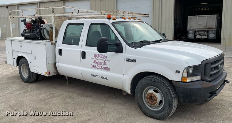 image for item LY9751 2004 Ford F350 Super Duty  Crew Cab utility bed pickup truck