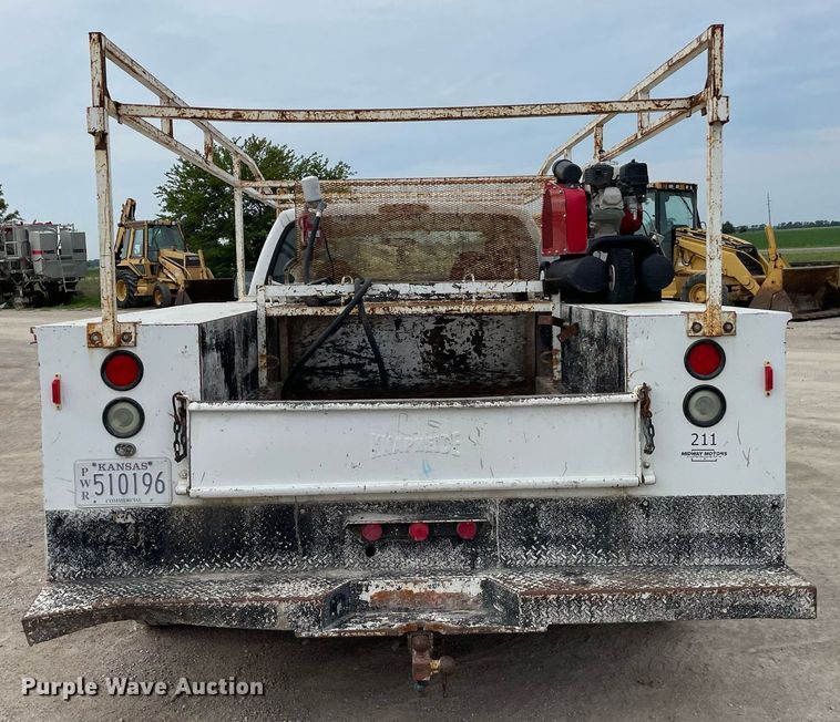 image for item LY9751 2004 Ford F350 Super Duty  Crew Cab utility bed pickup truck