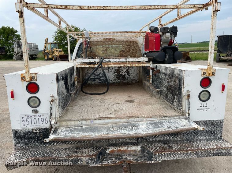 image for item LY9751 2004 Ford F350 Super Duty  Crew Cab utility bed pickup truck