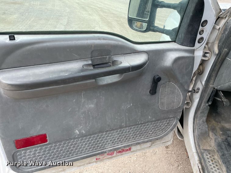 image for item LY9751 2004 Ford F350 Super Duty  Crew Cab utility bed pickup truck