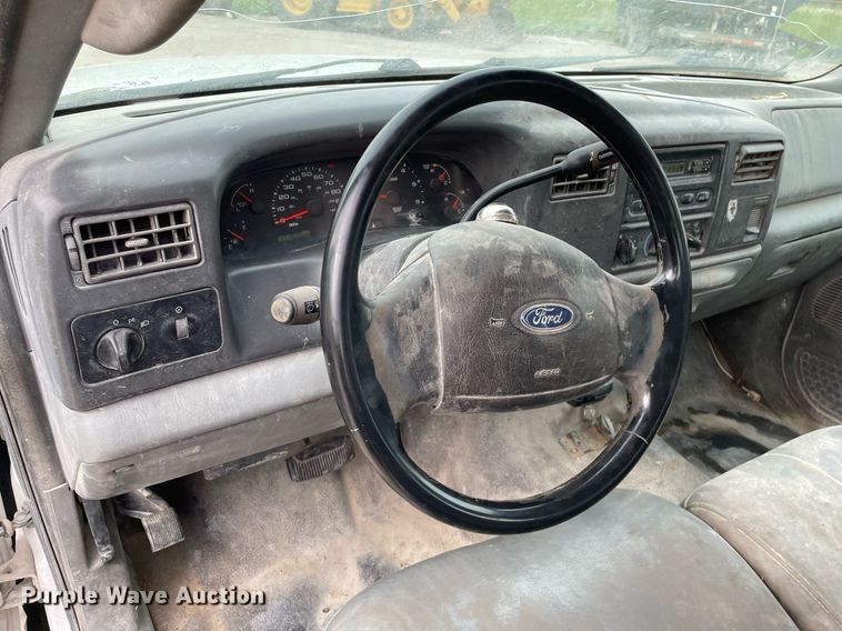 image for item LY9751 2004 Ford F350 Super Duty  Crew Cab utility bed pickup truck