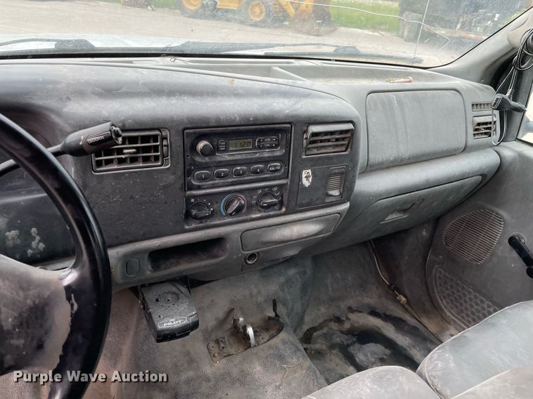 image for item LY9751 2004 Ford F350 Super Duty  Crew Cab utility bed pickup truck