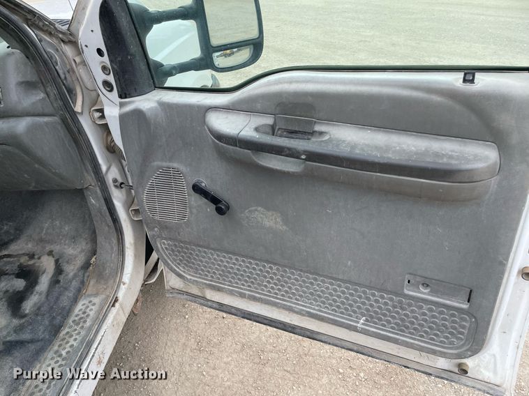 image for item LY9751 2004 Ford F350 Super Duty  Crew Cab utility bed pickup truck