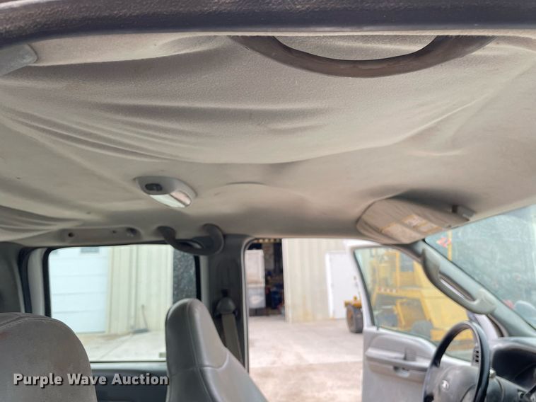 image for item LY9751 2004 Ford F350 Super Duty  Crew Cab utility bed pickup truck