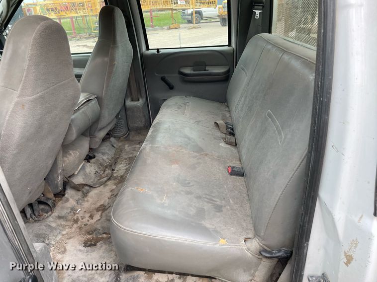 image for item LY9751 2004 Ford F350 Super Duty  Crew Cab utility bed pickup truck