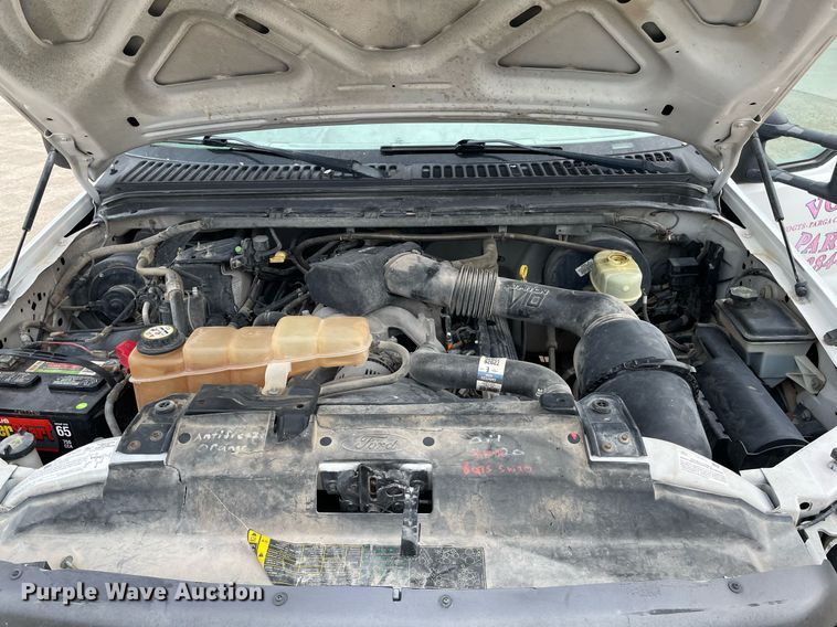 image for item LY9751 2004 Ford F350 Super Duty  Crew Cab utility bed pickup truck