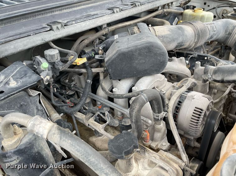 image for item LY9751 2004 Ford F350 Super Duty  Crew Cab utility bed pickup truck