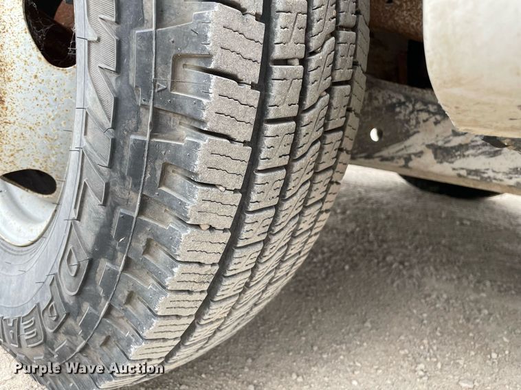 image for item LY9751 2004 Ford F350 Super Duty  Crew Cab utility bed pickup truck