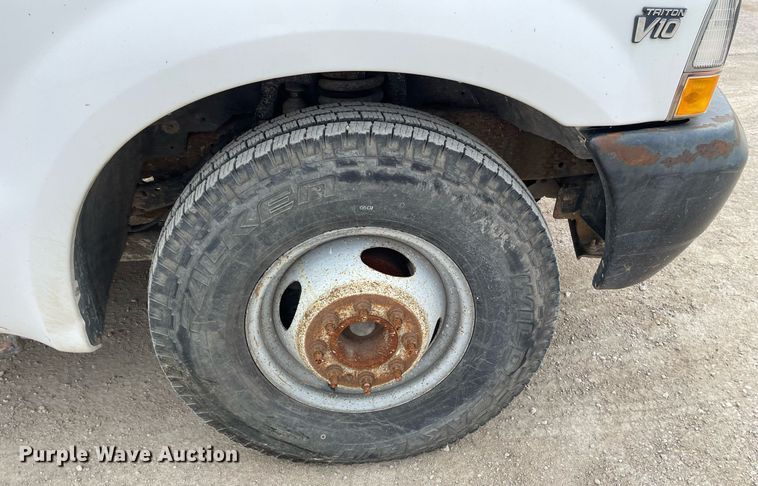 image for item LY9751 2004 Ford F350 Super Duty  Crew Cab utility bed pickup truck