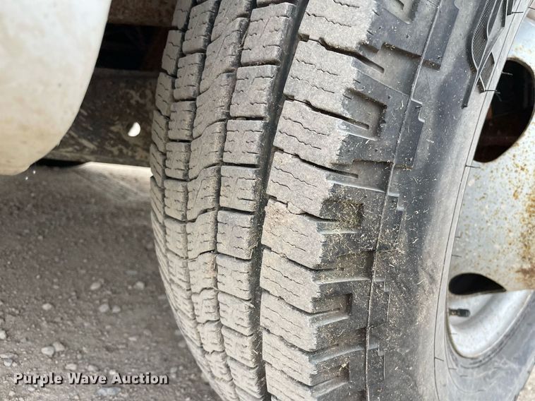 image for item LY9751 2004 Ford F350 Super Duty  Crew Cab utility bed pickup truck