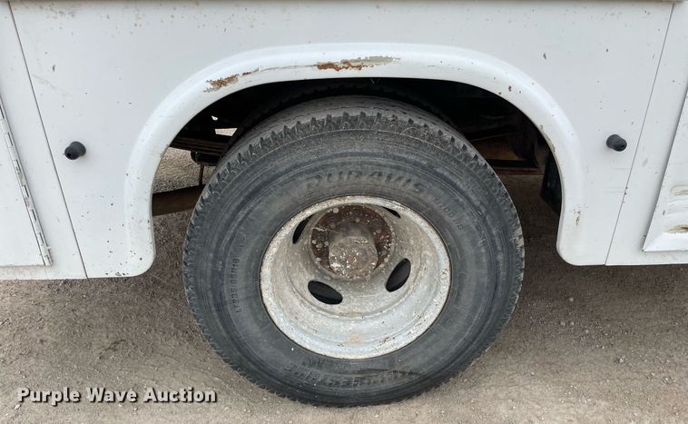 image for item LY9751 2004 Ford F350 Super Duty  Crew Cab utility bed pickup truck