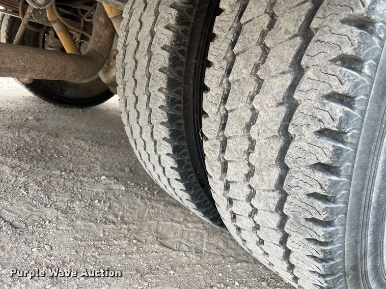 image for item LY9751 2004 Ford F350 Super Duty  Crew Cab utility bed pickup truck