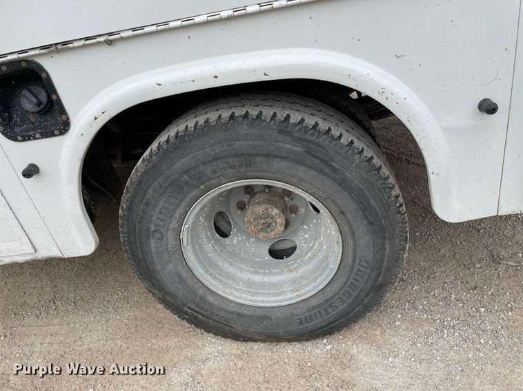 image for item LY9751 2004 Ford F350 Super Duty  Crew Cab utility bed pickup truck