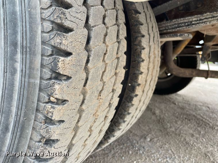 image for item LY9751 2004 Ford F350 Super Duty  Crew Cab utility bed pickup truck