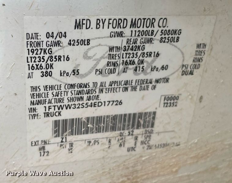 image for item LY9751 2004 Ford F350 Super Duty  Crew Cab utility bed pickup truck