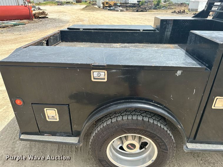 image for item MB9609 2011 GMC Sierra 3500HD  Crew Cab flatbed pickup truck