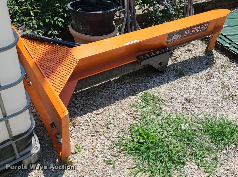 Wolfe Ridge Manufacturing skid steer wood splitter in Oak Grove, MO