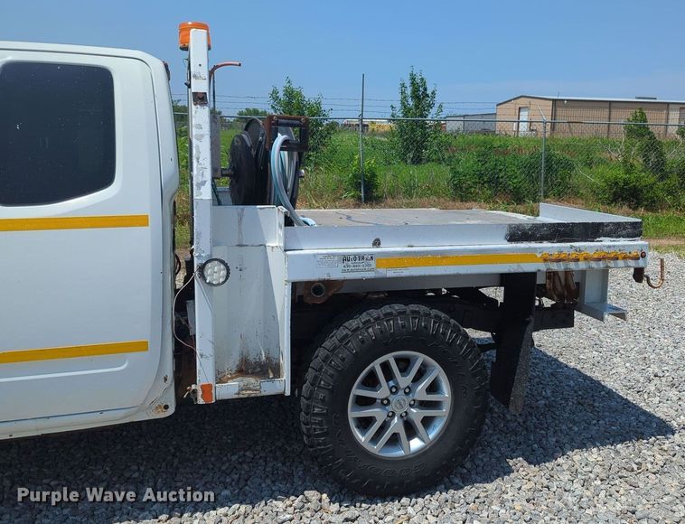 image for item MX9330 2015 Nissan Frontier  King Cab flatbed pickup truck