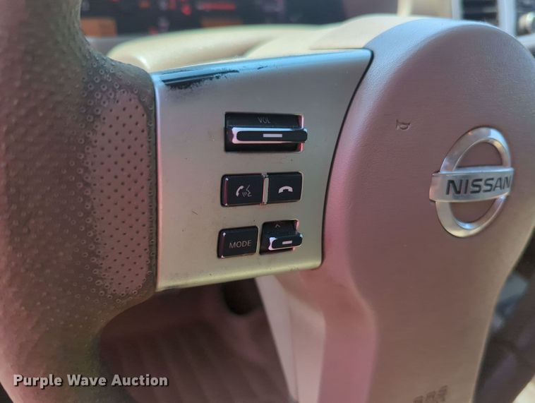 image for item MX9330 2015 Nissan Frontier  King Cab flatbed pickup truck