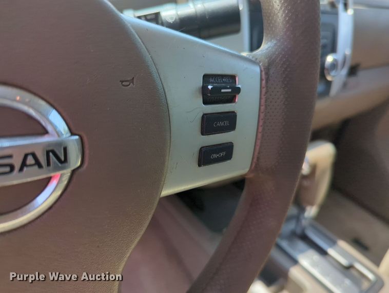 image for item MX9330 2015 Nissan Frontier  King Cab flatbed pickup truck