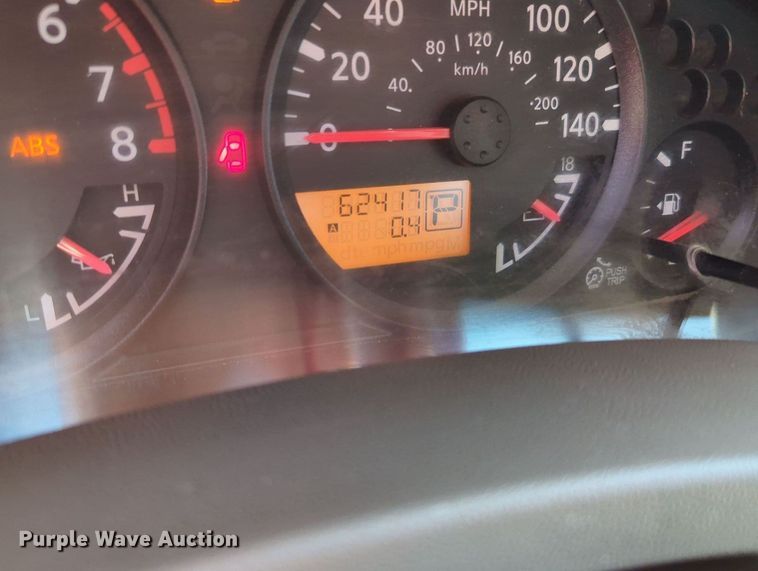 image for item MX9330 2015 Nissan Frontier  King Cab flatbed pickup truck