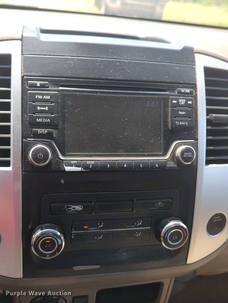 image for item MX9330 2015 Nissan Frontier  King Cab flatbed pickup truck