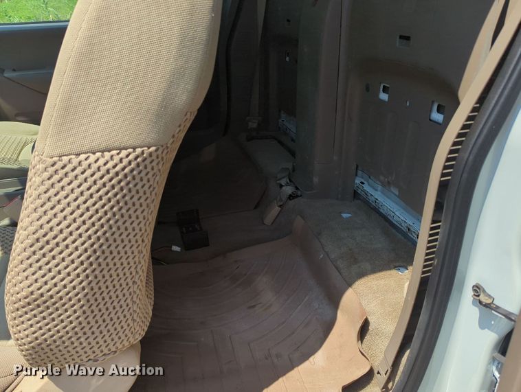 image for item MX9330 2015 Nissan Frontier  King Cab flatbed pickup truck