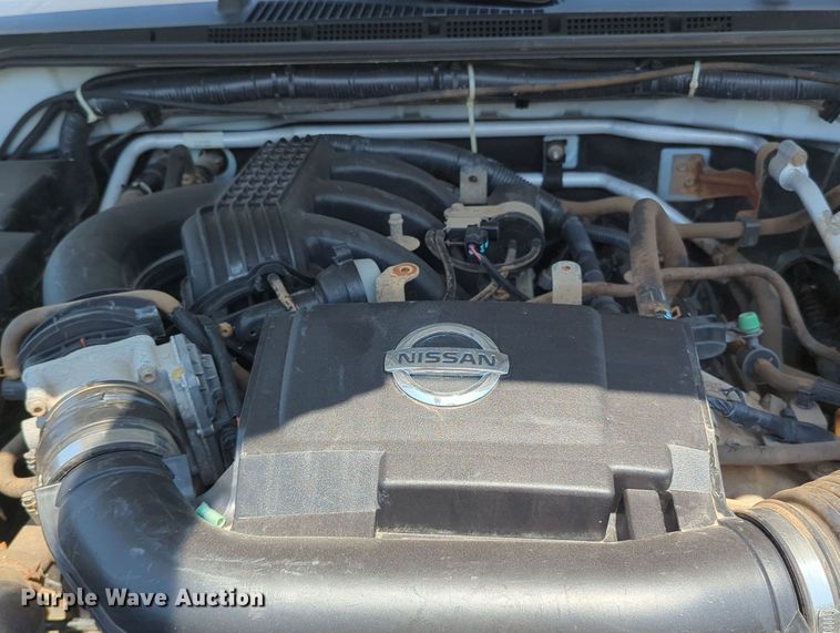 image for item MX9330 2015 Nissan Frontier  King Cab flatbed pickup truck