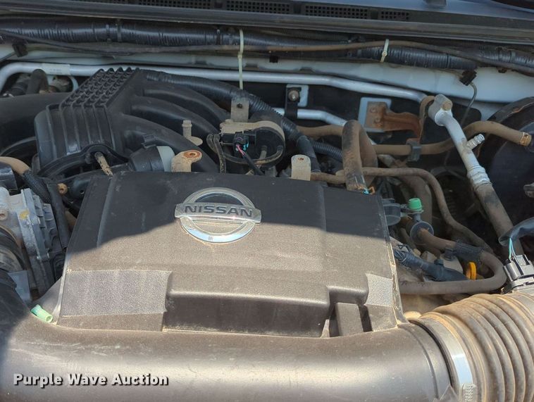 image for item MX9330 2015 Nissan Frontier  King Cab flatbed pickup truck