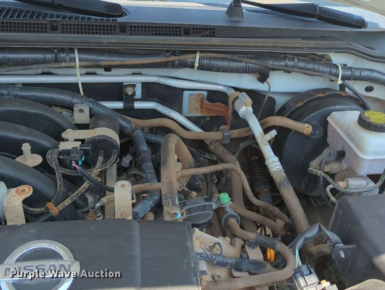 image for item MX9330 2015 Nissan Frontier  King Cab flatbed pickup truck