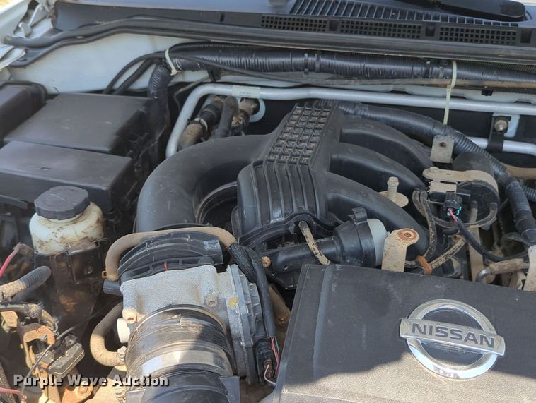 image for item MX9330 2015 Nissan Frontier  King Cab flatbed pickup truck