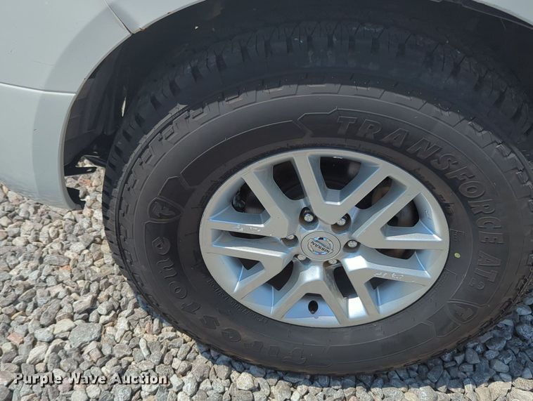 image for item MX9330 2015 Nissan Frontier  King Cab flatbed pickup truck