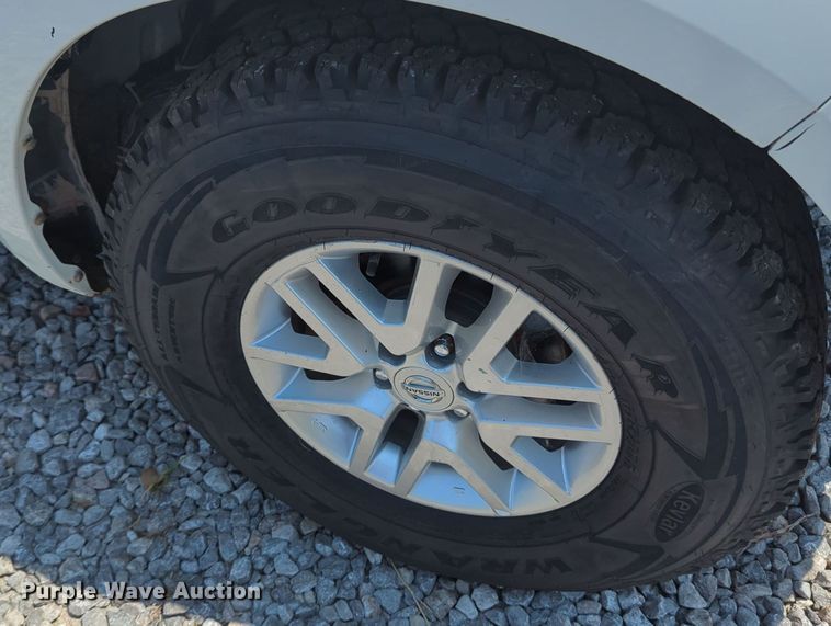 image for item MX9330 2015 Nissan Frontier  King Cab flatbed pickup truck