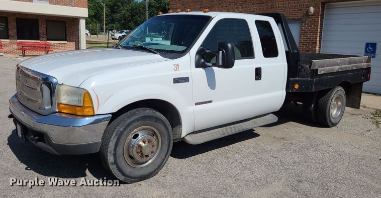 image for item NX9597 2000 Ford F350 Super Duty XLT  SuperCab flatbed pickup truck