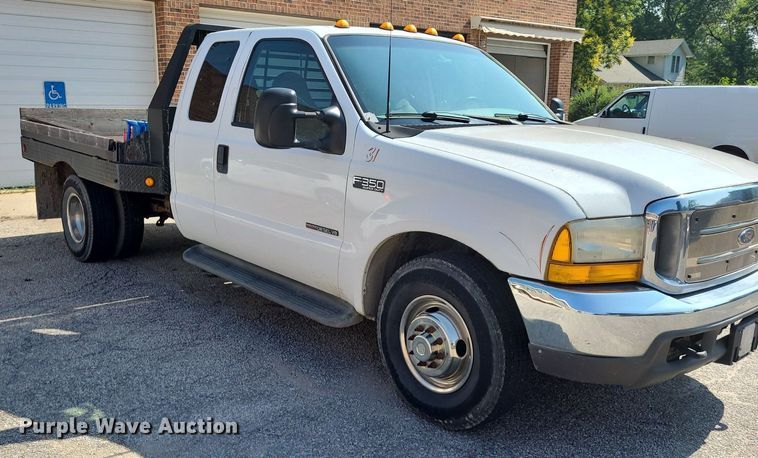 image for item NX9597 2000 Ford F350 Super Duty XLT  SuperCab flatbed pickup truck