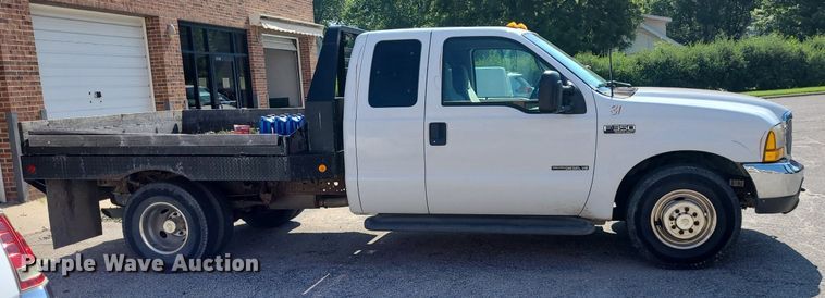 image for item NX9597 2000 Ford F350 Super Duty XLT  SuperCab flatbed pickup truck