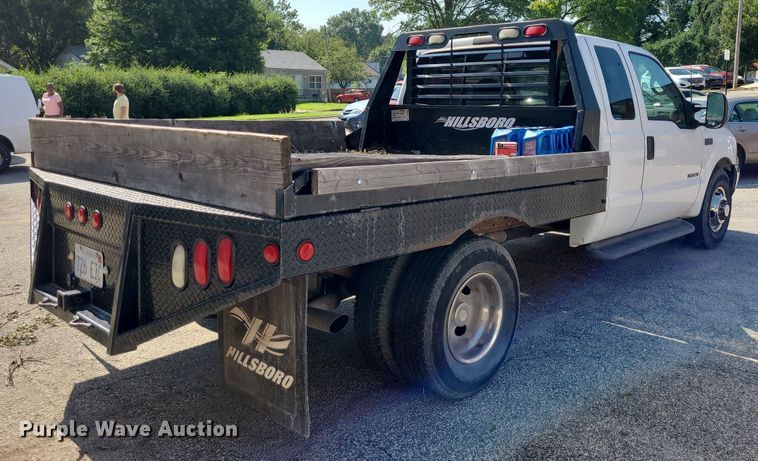 image for item NX9597 2000 Ford F350 Super Duty XLT  SuperCab flatbed pickup truck