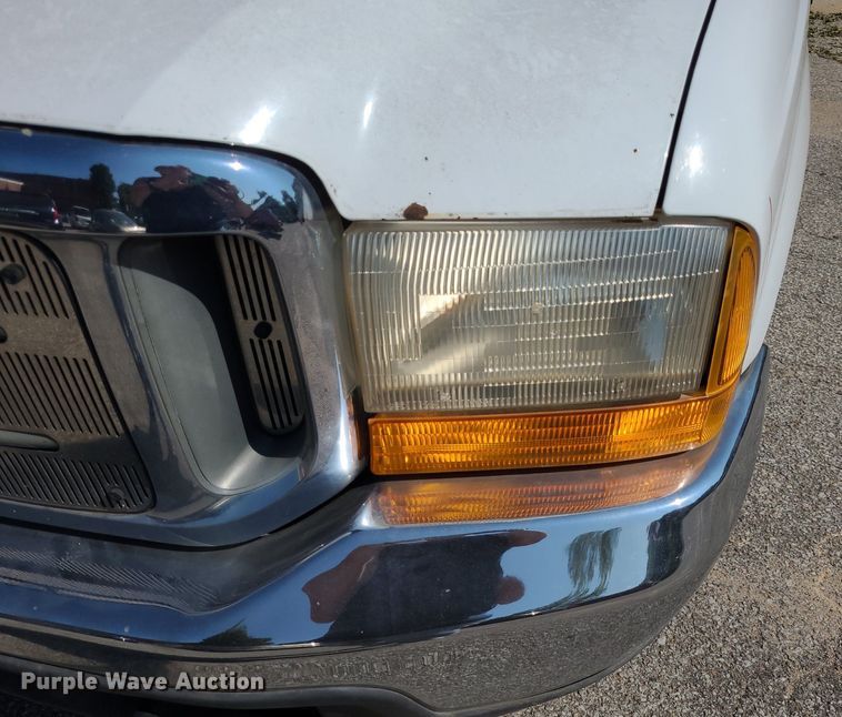 image for item NX9597 2000 Ford F350 Super Duty XLT  SuperCab flatbed pickup truck