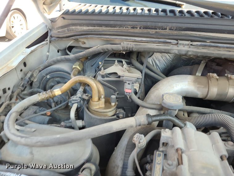 image for item NX9597 2000 Ford F350 Super Duty XLT  SuperCab flatbed pickup truck