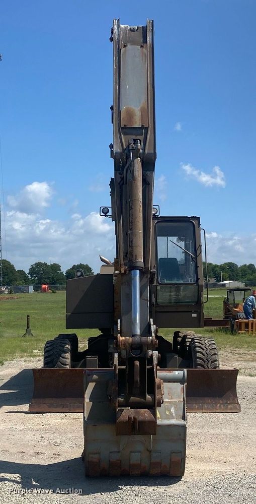 image for item DI7838 1987 John Deere 690CR  wheeled excavator