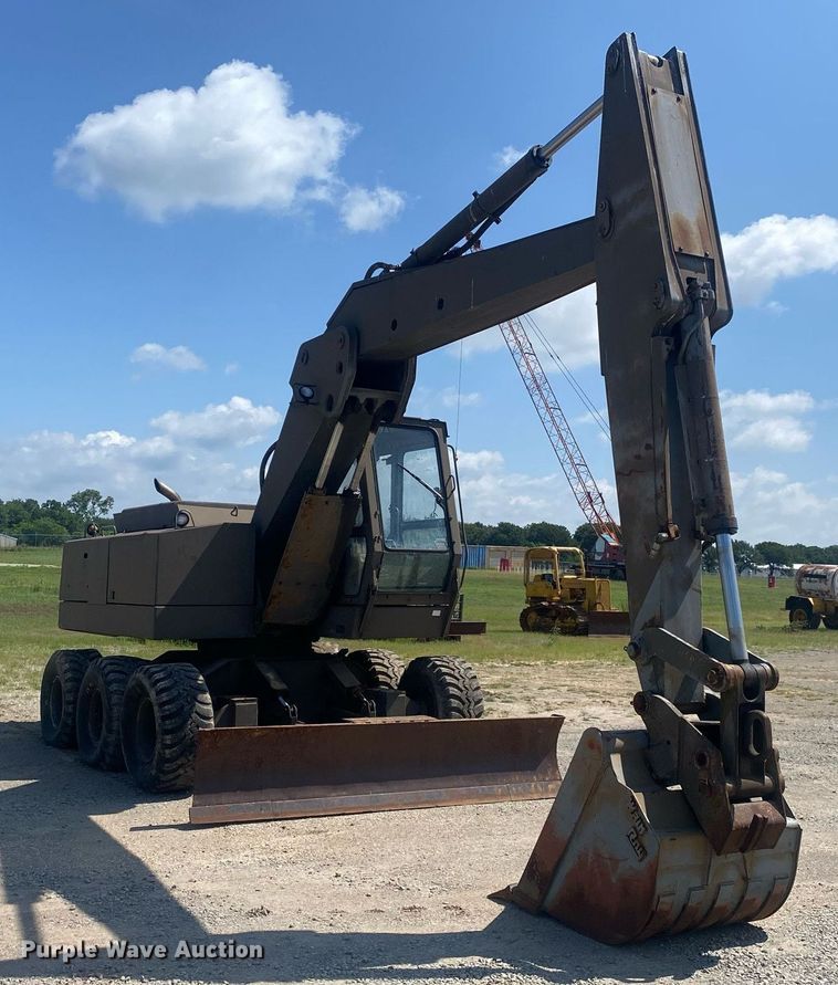 image for item DI7838 1987 John Deere 690CR  wheeled excavator