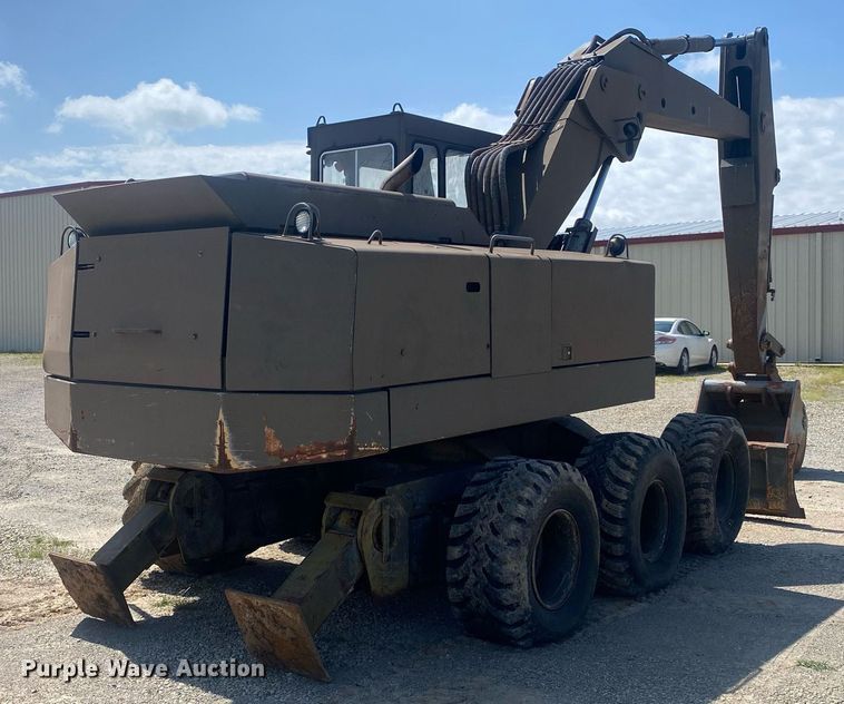 image for item DI7838 1987 John Deere 690CR  wheeled excavator