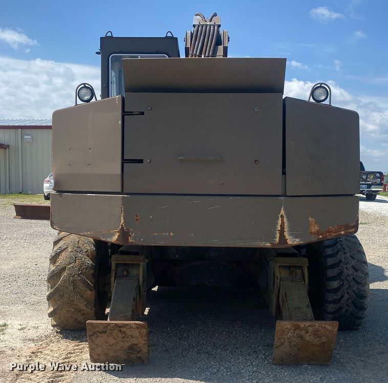 image for item DI7838 1987 John Deere 690CR  wheeled excavator