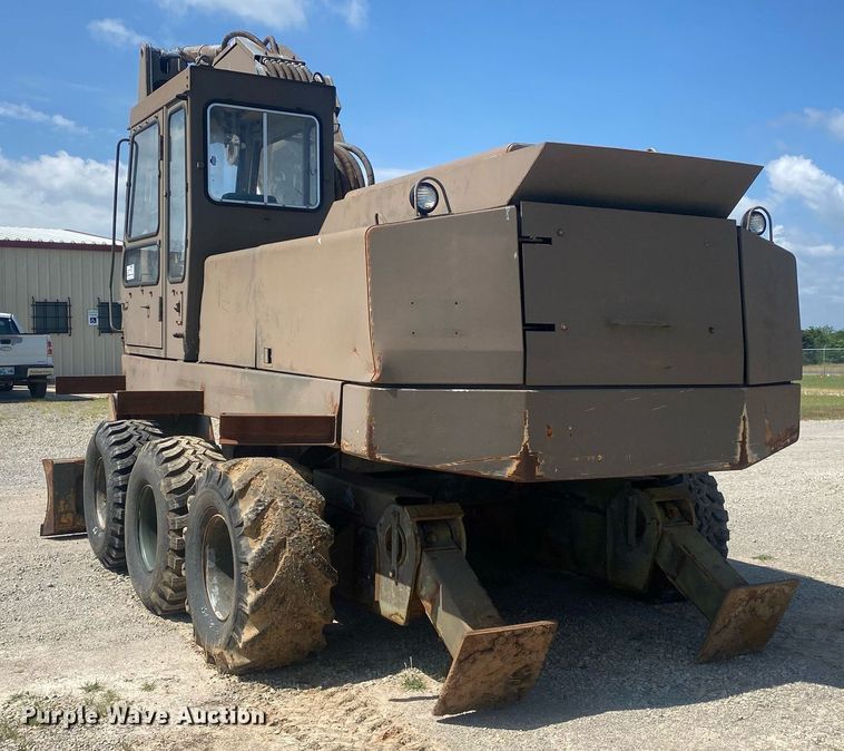 image for item DI7838 1987 John Deere 690CR  wheeled excavator