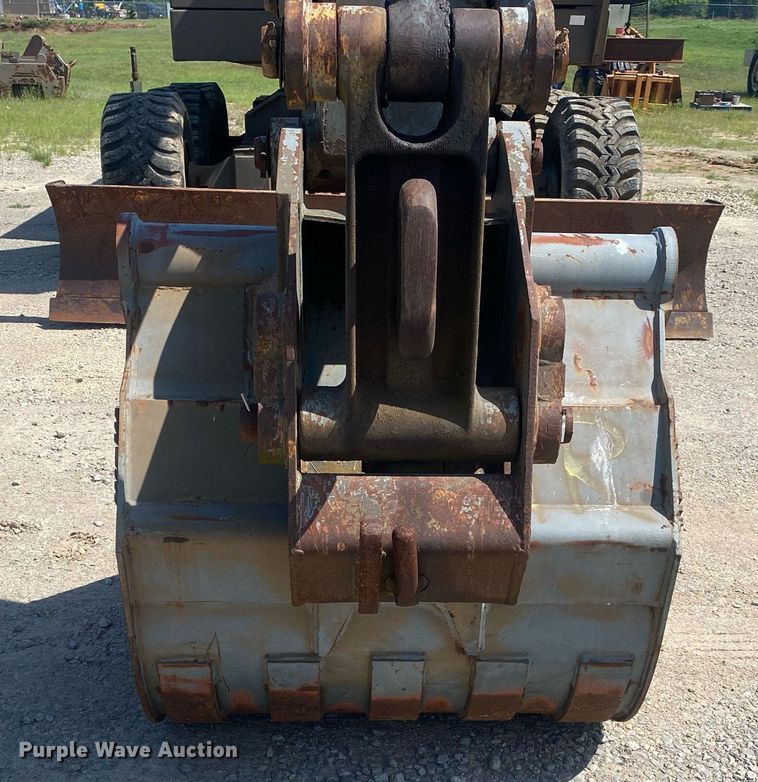 image for item DI7838 1987 John Deere 690CR  wheeled excavator