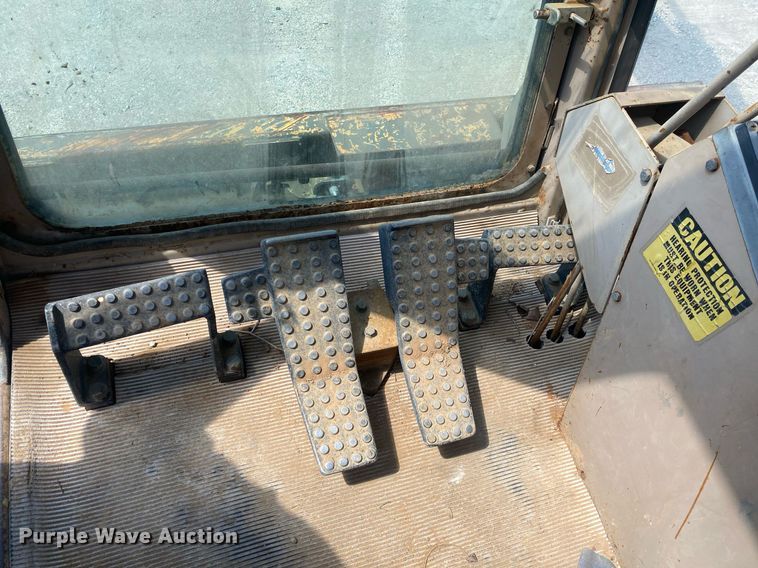 image for item DI7838 1987 John Deere 690CR  wheeled excavator